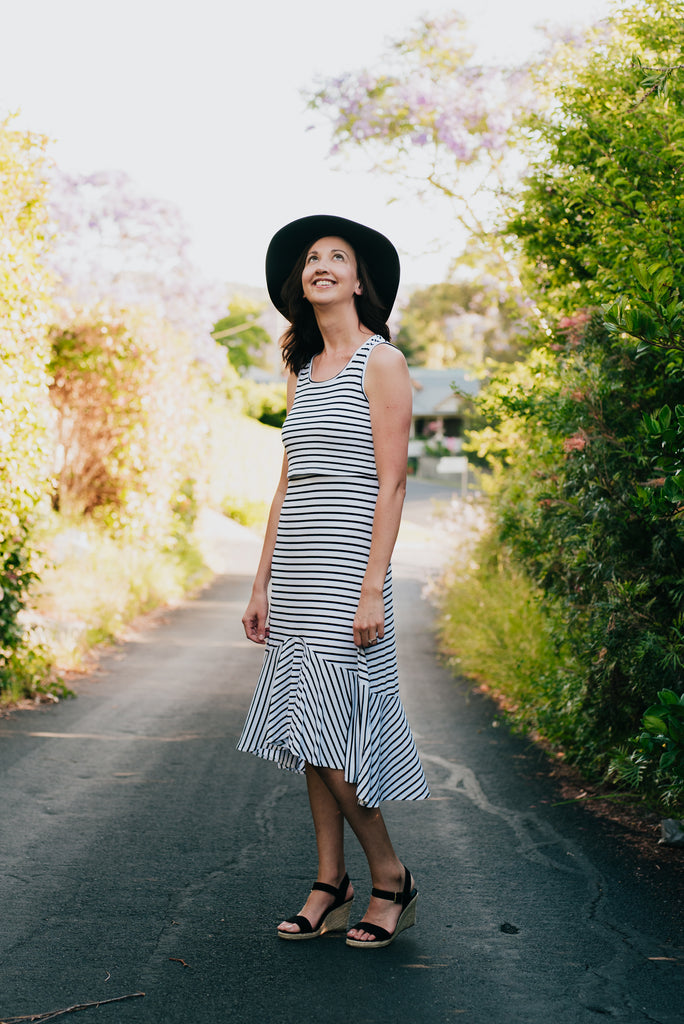 Black and white stripe breastfeeding dress with lift up panel for nursing mums.