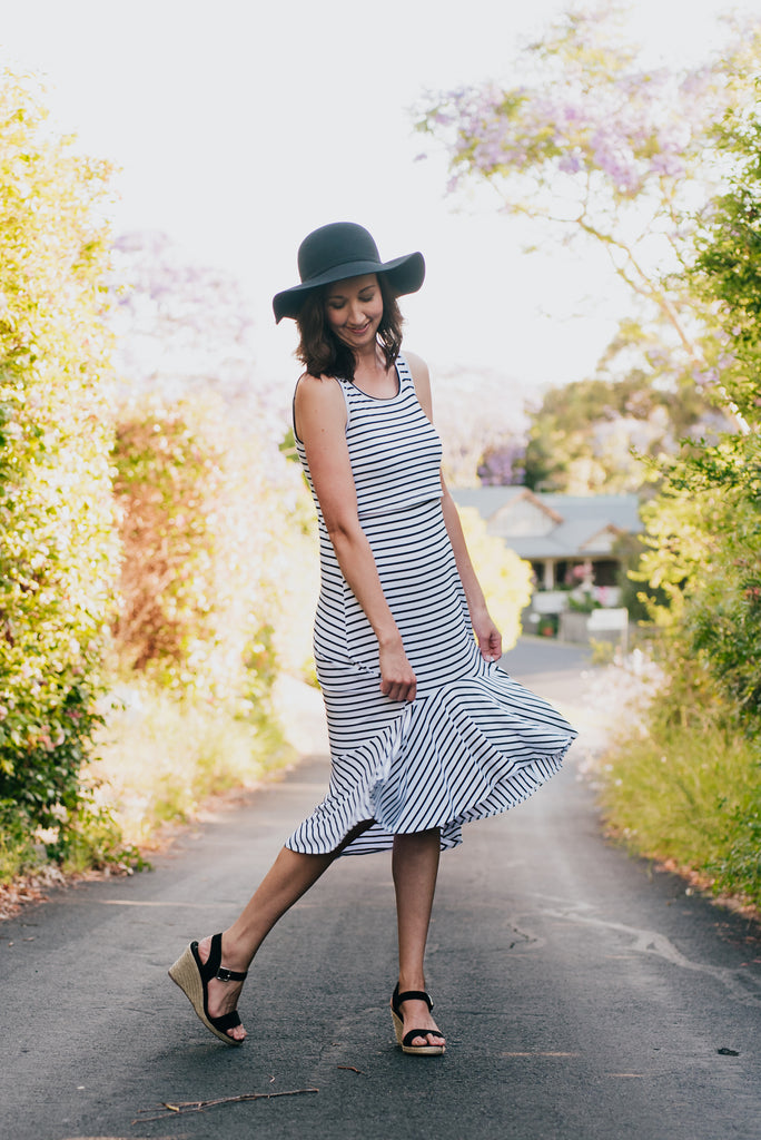 Black and white stripe breastfeeding dress with lift up panel for nursing mums.